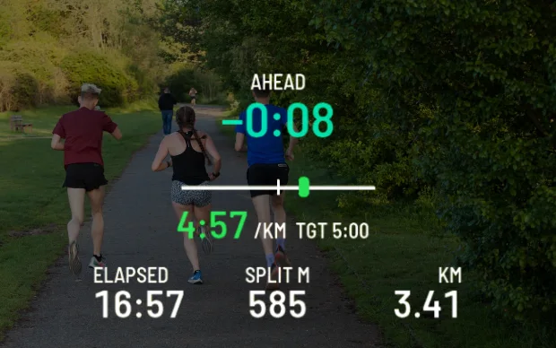 Race pacer HUD showing seconds ahead of target on a park run